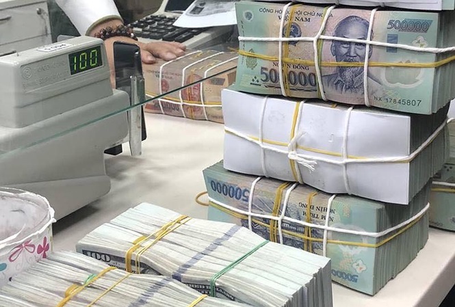 Tin tức kinh tế ngày 1/10: Tiền gửi vẫn ồ ạt chảy vào ngân hàng Tin tức kinh tế ngày 1/10: Tiền gửi vẫn ồ ạt chảy vào ngân hàng
