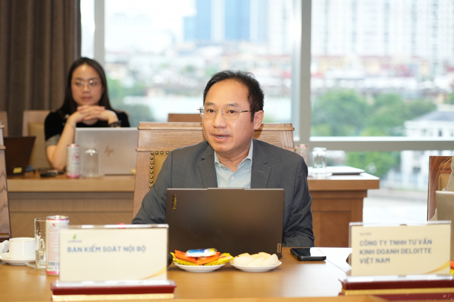 Đại diện Deloitte báo cáo tại buổi làm việc
