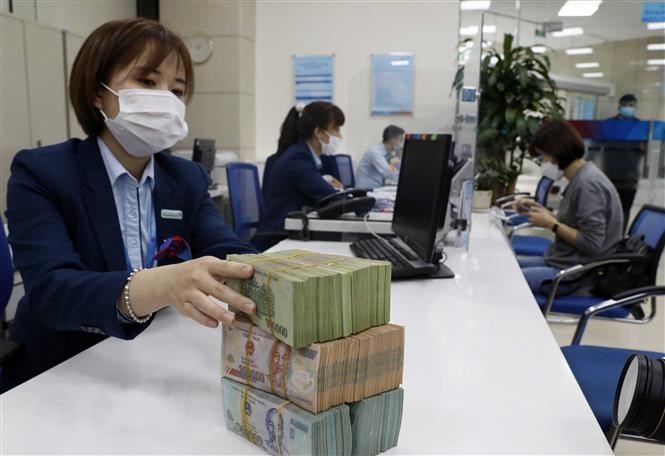 Ngân hàng nỗ lực kìm lãi suất cho vay để hỗ trợ phục hồi kinh tế