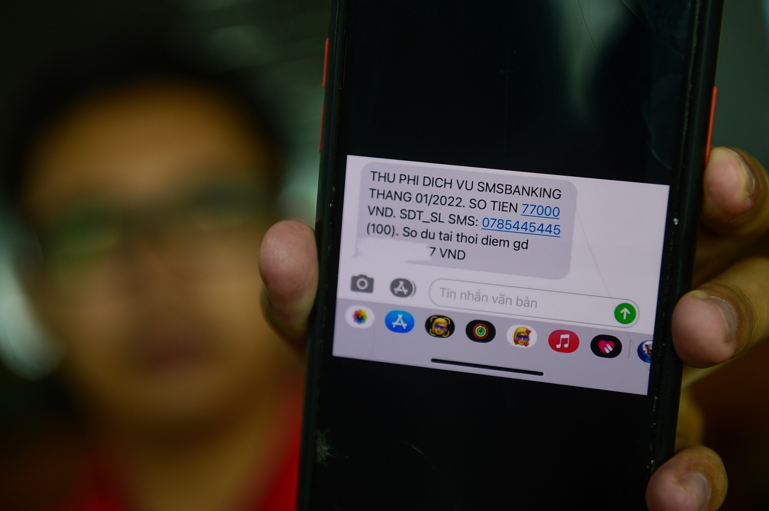 Tin nhắn thu phí dịch vụ SMS banking tháng 1-2022 là 77.000 đồng từ Vietcombank - Ảnh: Q.ĐỊNH Tin nhắn thu phí dịch vụ SMS banking tháng 1-2022 là 77.000 đồng từ Vietcombank - Ảnh: Q.ĐỊNH