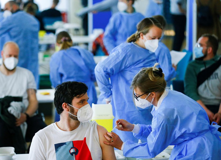 JPMorgan: Covid-19 chấm dứt vào 2022, kinh tế toàn cầu phục hồi hoàn toàn - 1